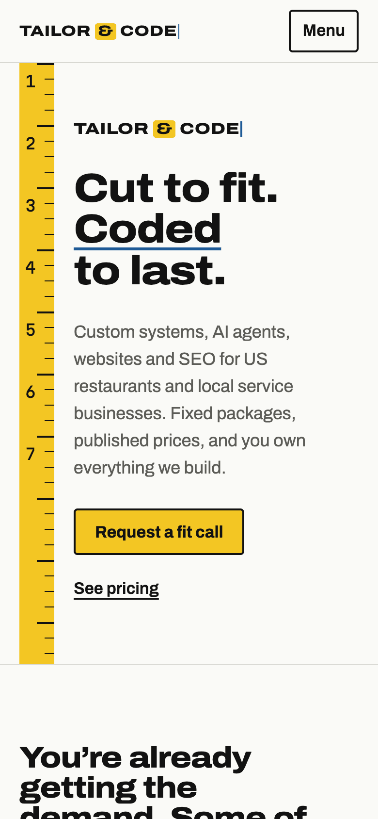 The Tailor & Code website on a phone